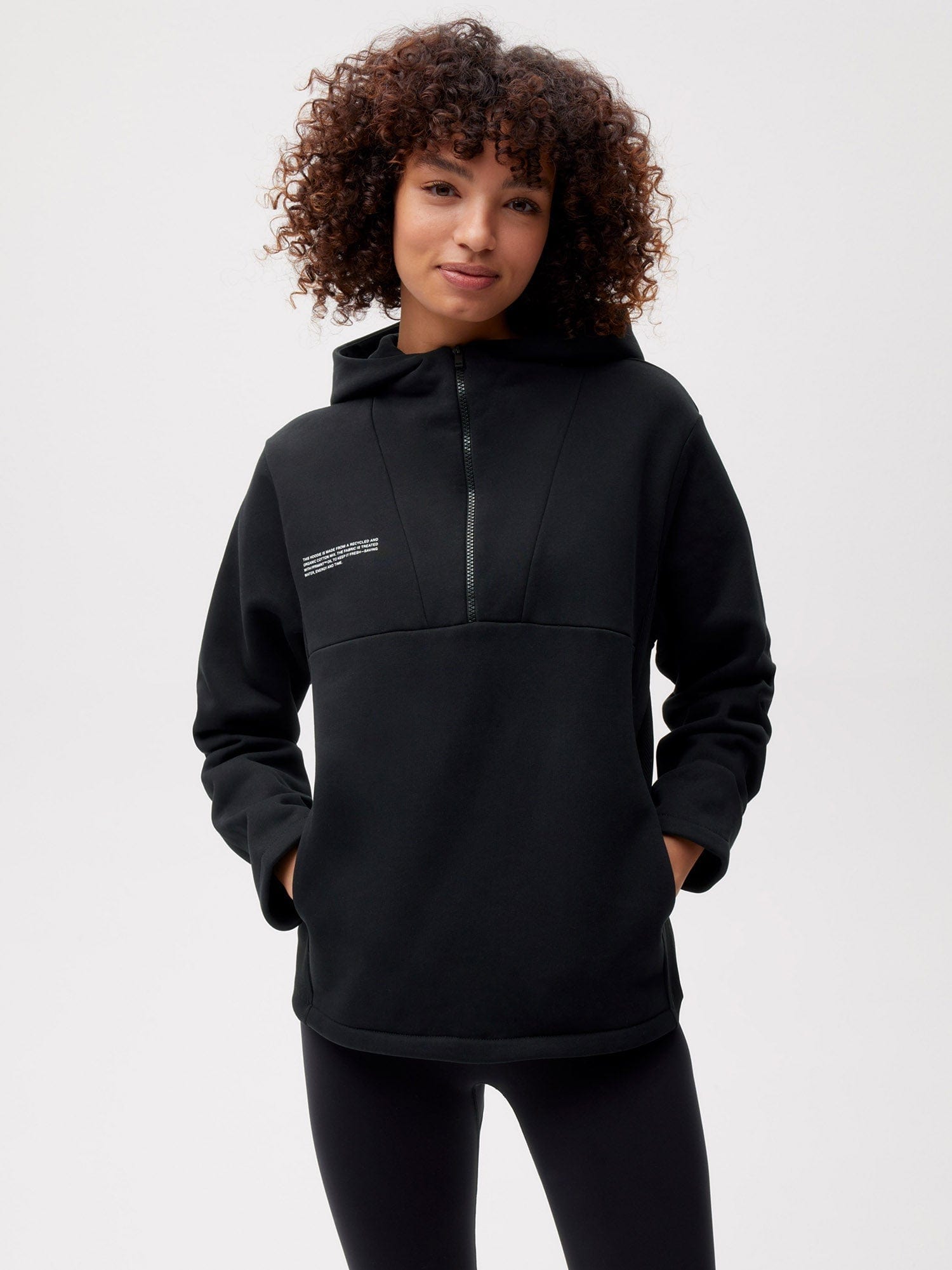 https://cdn.shopify.com/s/files/1/0035/1309/0115/products/Half-Zipped-Hoodie-Black-Female-1.jpg?v=1662476330