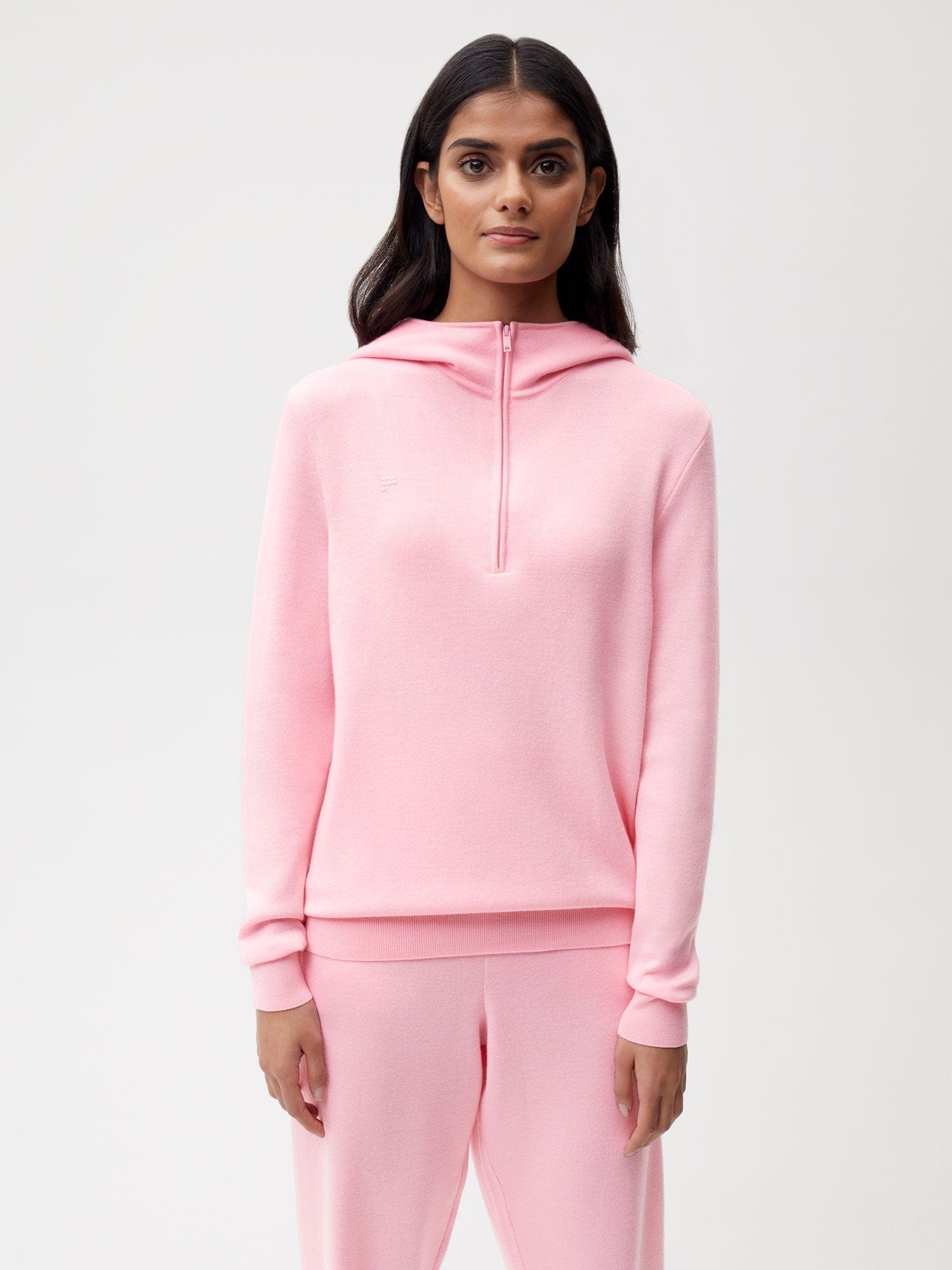 https://cdn.shopify.com/s/files/1/0035/1309/0115/products/Merino-Half-Zip-Hoodie-Sakura-Pink-Female-1.jpg?v=1662476288