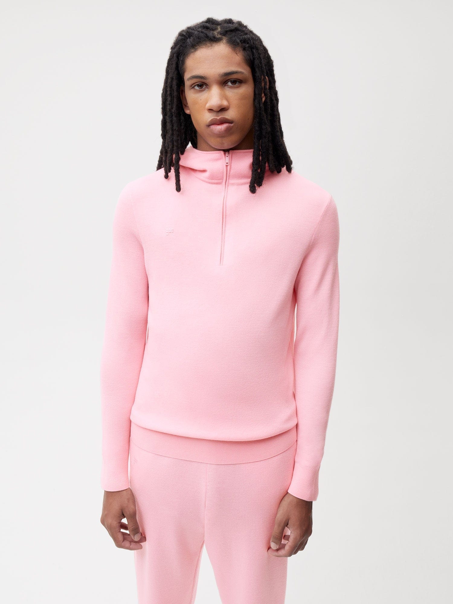 https://cdn.shopify.com/s/files/1/0035/1309/0115/products/Merino-Half-Zip-Hoodie-Sakura-Pink-Male-1.jpg?v=1662476288