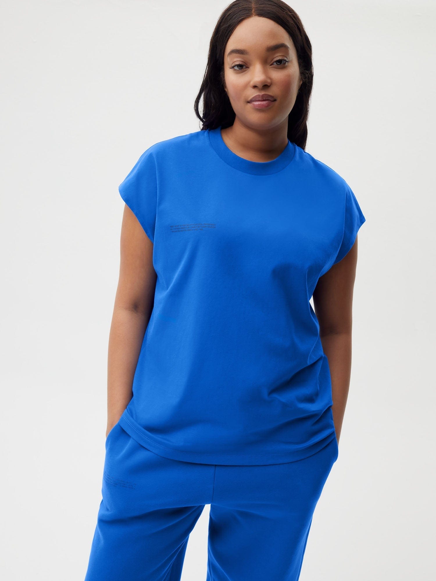 https://cdn.shopify.com/s/files/1/0035/1309/0115/products/Organic-Cotton-Cropped-Shoulder-T-Shirt-Cobalt-Blue-Female-5.jpg?v=1662475235