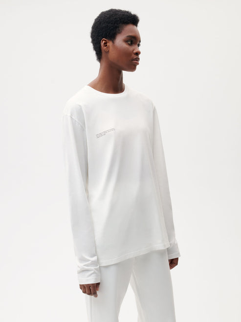 https://cdn.shopify.com/s/files/1/0035/1309/0115/products/Organic-Cotton-Lightweight-Long-Sleeve-T-Shirt-Off-White-Female-1.jpg?v=1663057308&width=493