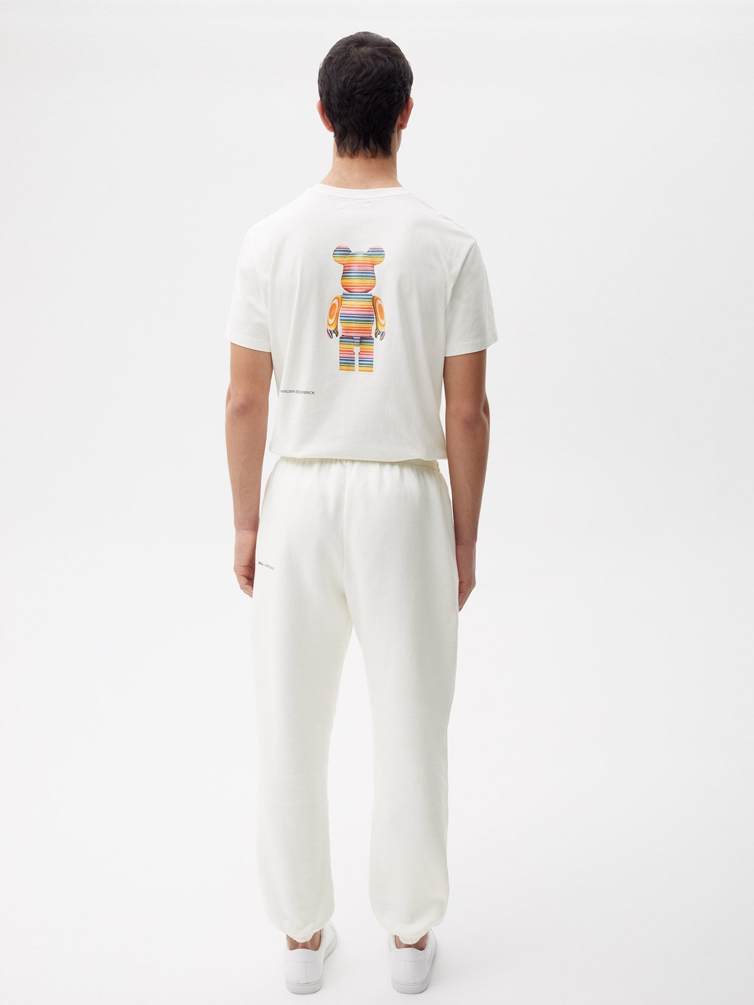 https://cdn.shopify.com/s/files/1/0035/1309/0115/products/Pangaia-Haroshi-Bearbrick-Heavyweight-Organic-Cotton-Track-Pants-Off-White-Male-2.jpg?v=1662475459