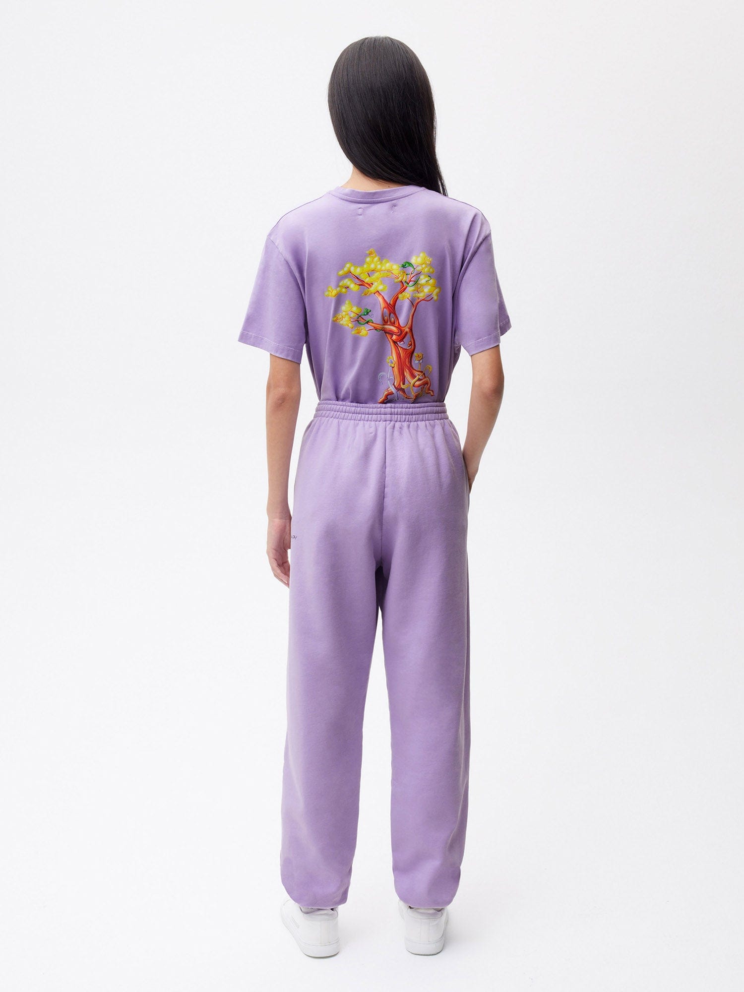 https://cdn.shopify.com/s/files/1/0035/1309/0115/products/Pangaia-Kenny-Scharf-365-Signature-Track-Pants-Paradis-Perdu-Orchid-Purple-Female-2.jpg?v=1662735693