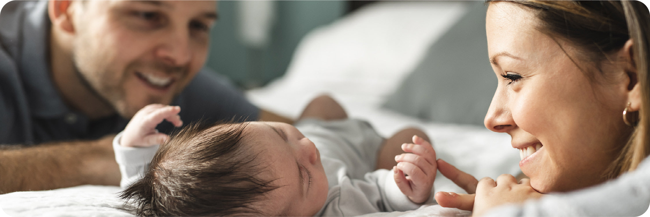 mom and dad with baby