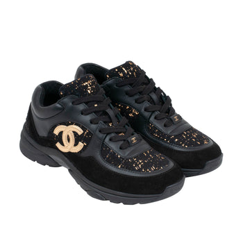 black and gold chanel trainers