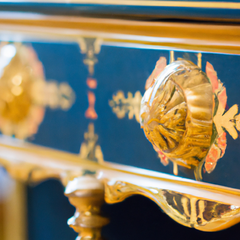 ic: Ancient Greek painted furniture with gold gilded motif details with blue drawers