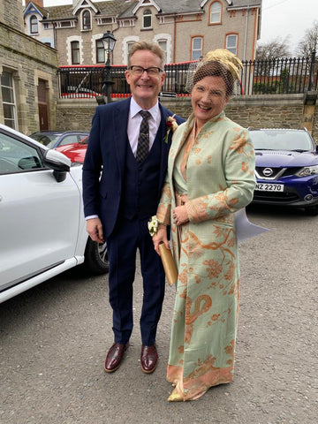 Mother and father of the groom, mother of the groom wears a floorlength maxi coat, the devi in Eggshell with a matching dress kimono