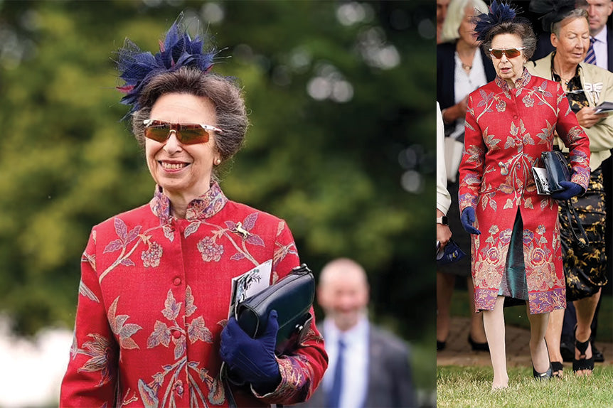 Princess Anne attends Ladies Day at Newmarket Racecourse wearing Shibumi Venetian Red Nehru Coat