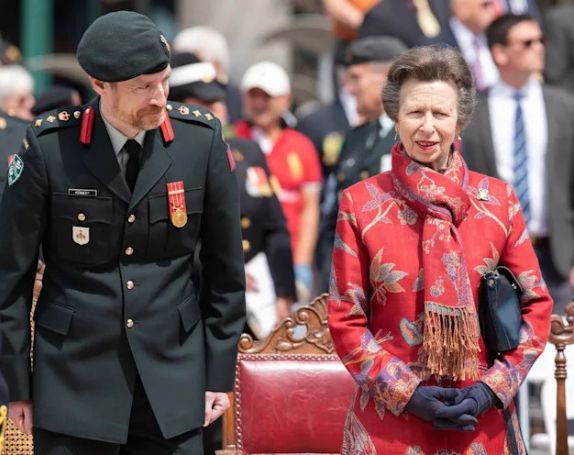 Princess Anne Princess Royal wearing Venetian Red Shibumi Nehru Coat at 17th anniversary of 8th Canadian Hussars