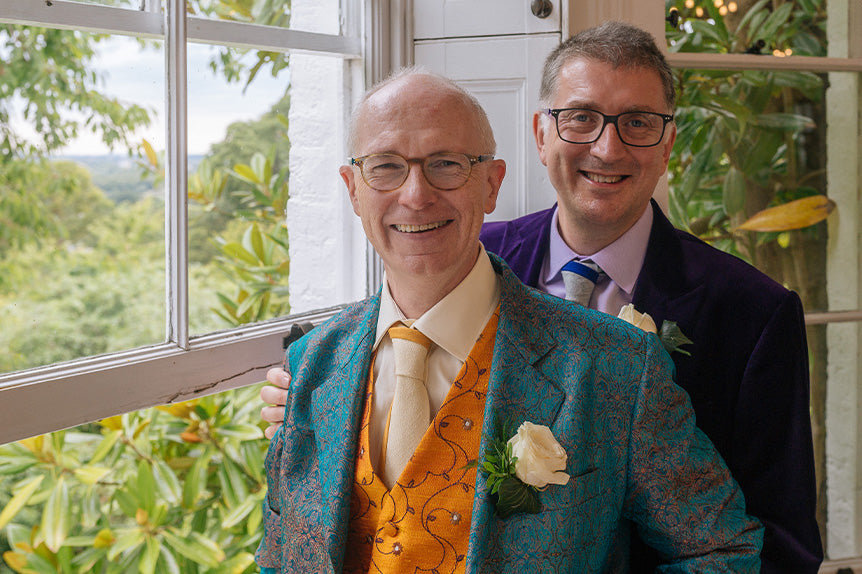 alternative groom outfit blue patterned jacket and yellow patterned waistcoat