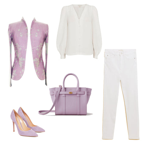 A lilac cashmere jacket shown as part of a casual outfit with white jeans, white blouse and lilac shoes.