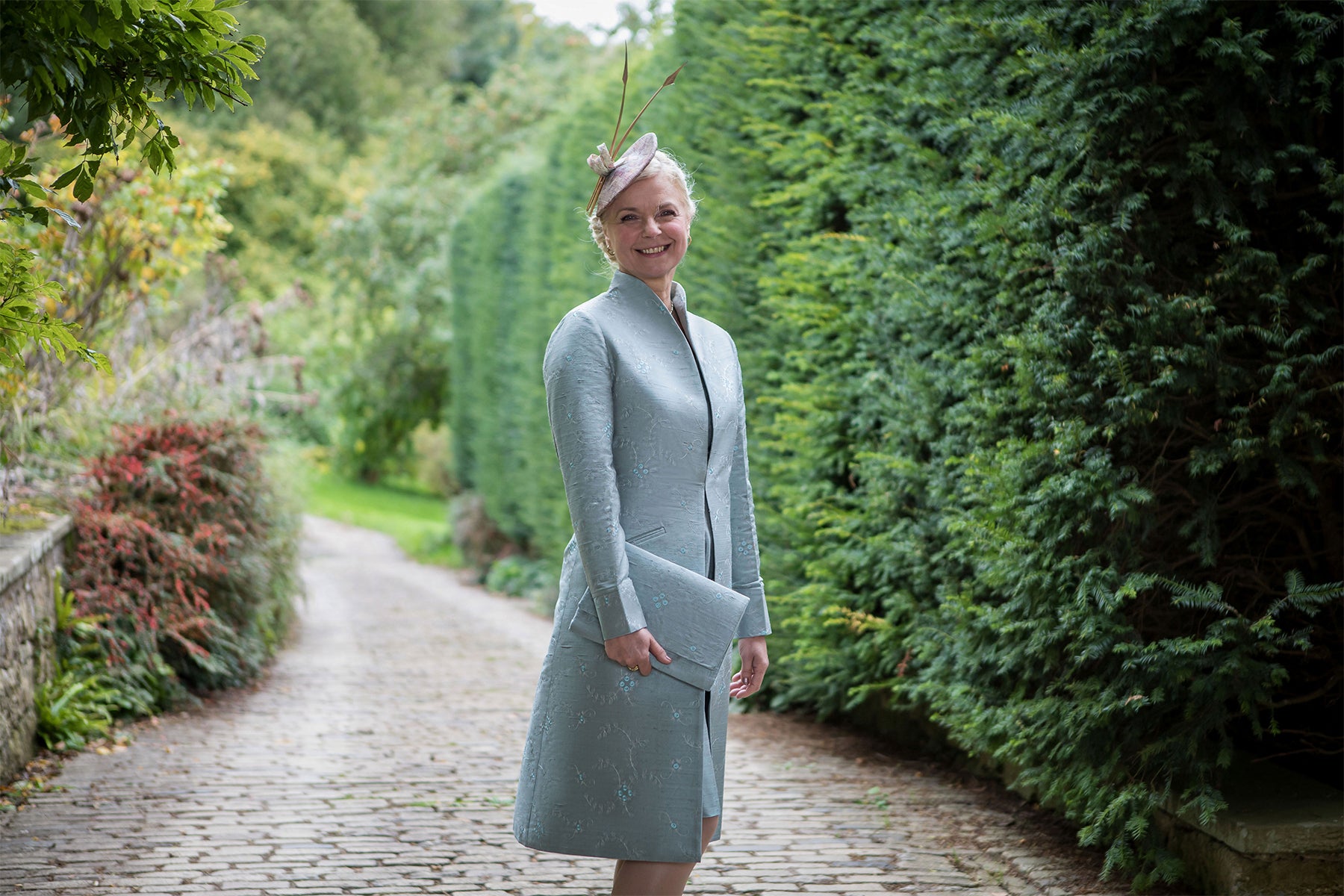 Pale blue and grey embroidered silk wedding coat, with matching headpiece and clutch bag