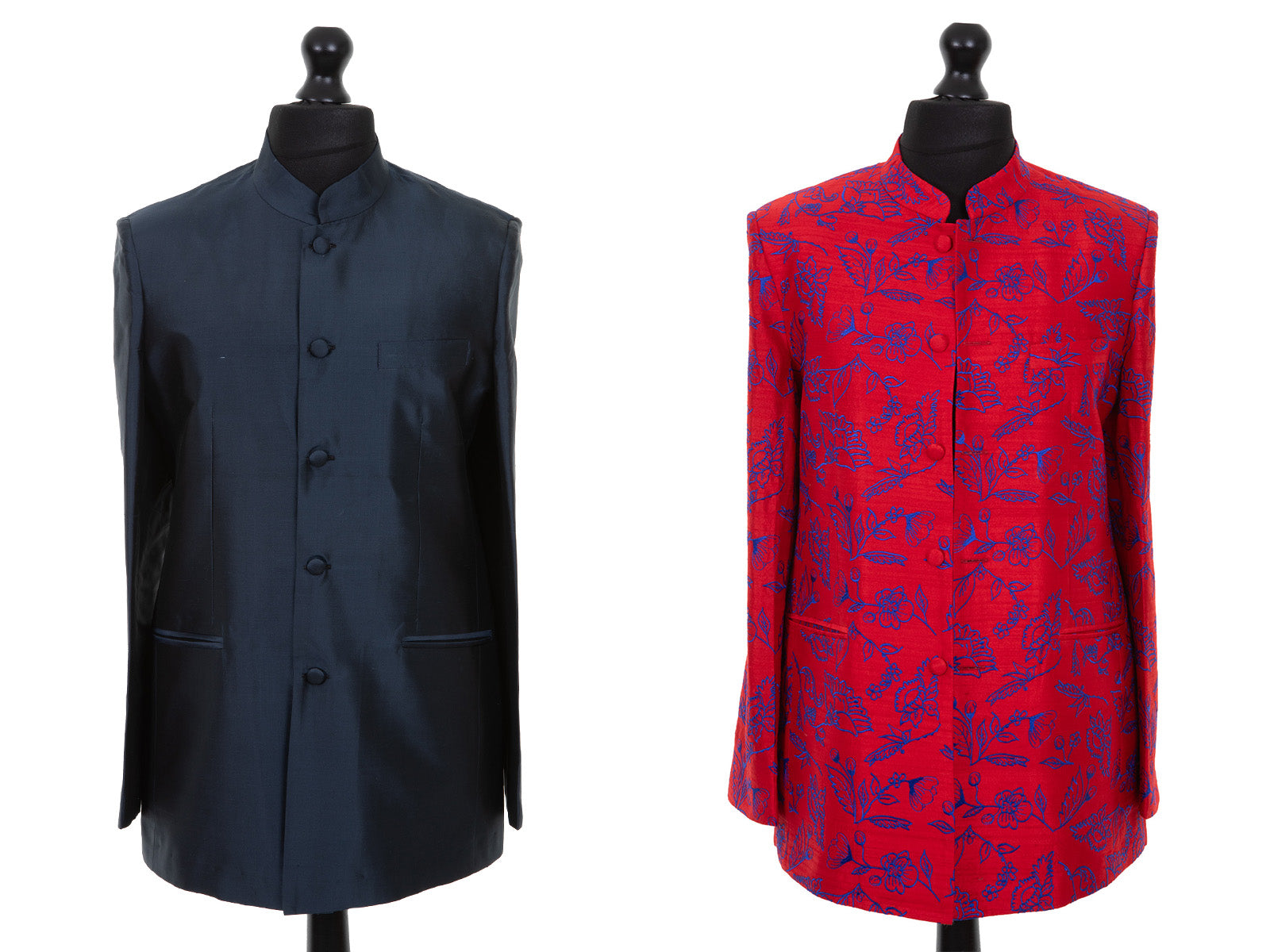 Mens nehru jacket in plain slate grey raw silk on the left and pillar box red embroidered silk, with cobalt embroidery on the right