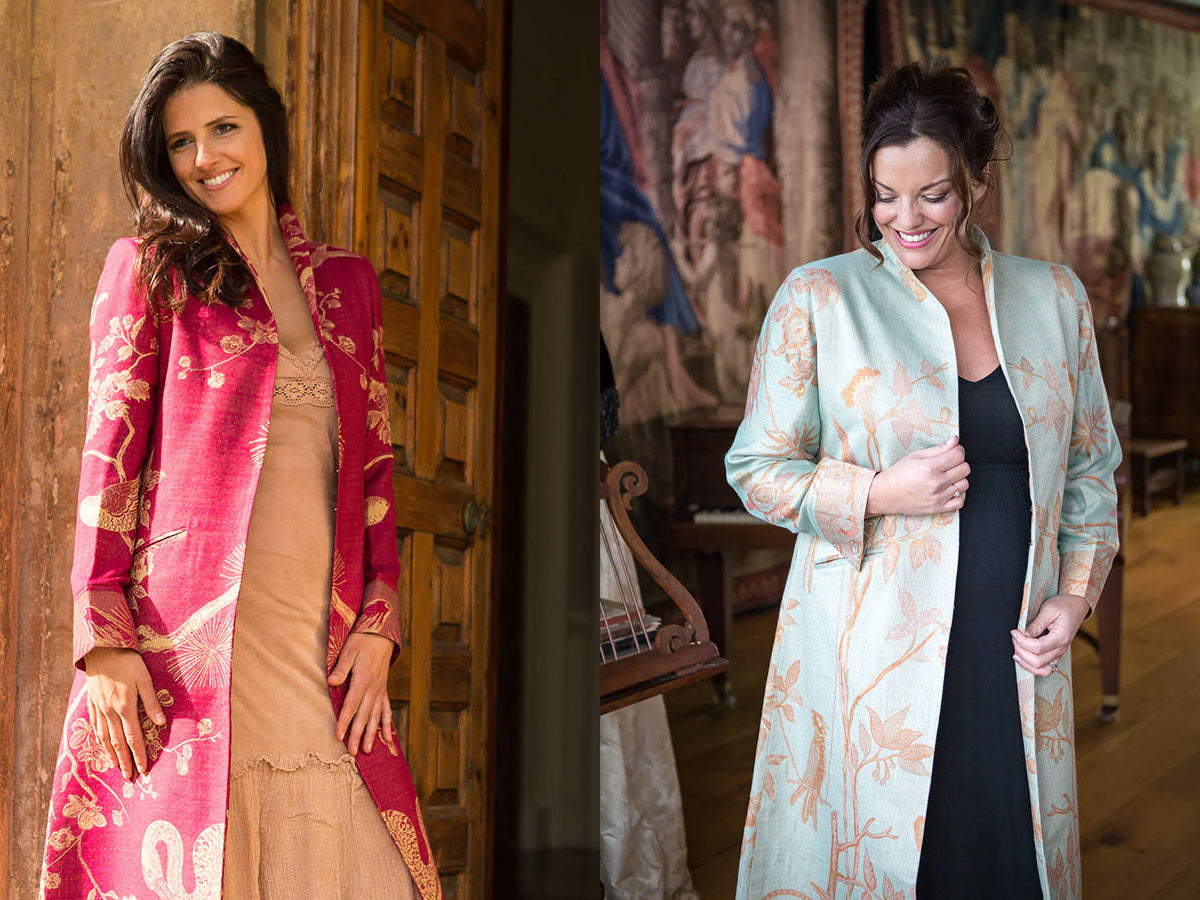 Lady with brown hair wearing a long coat in beautiful red with beautiful pattern. Woman looking down wearing full length coat in egg shell.