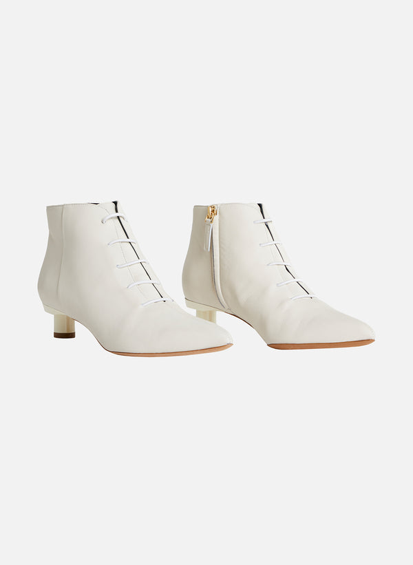 tibi white booties