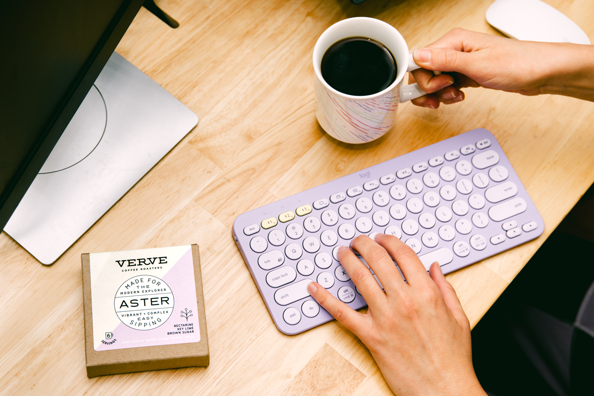 Aster Craft Instant Coffee being enjoyed at the computer