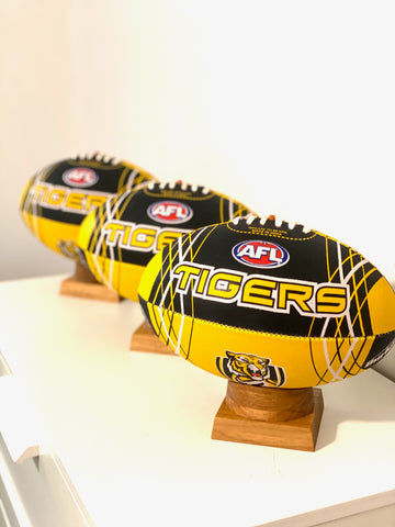 AFL Football Urn - 3 Richmond Tigers AFL balls.  Urns for cremated ashes on hand crafted timber stands.