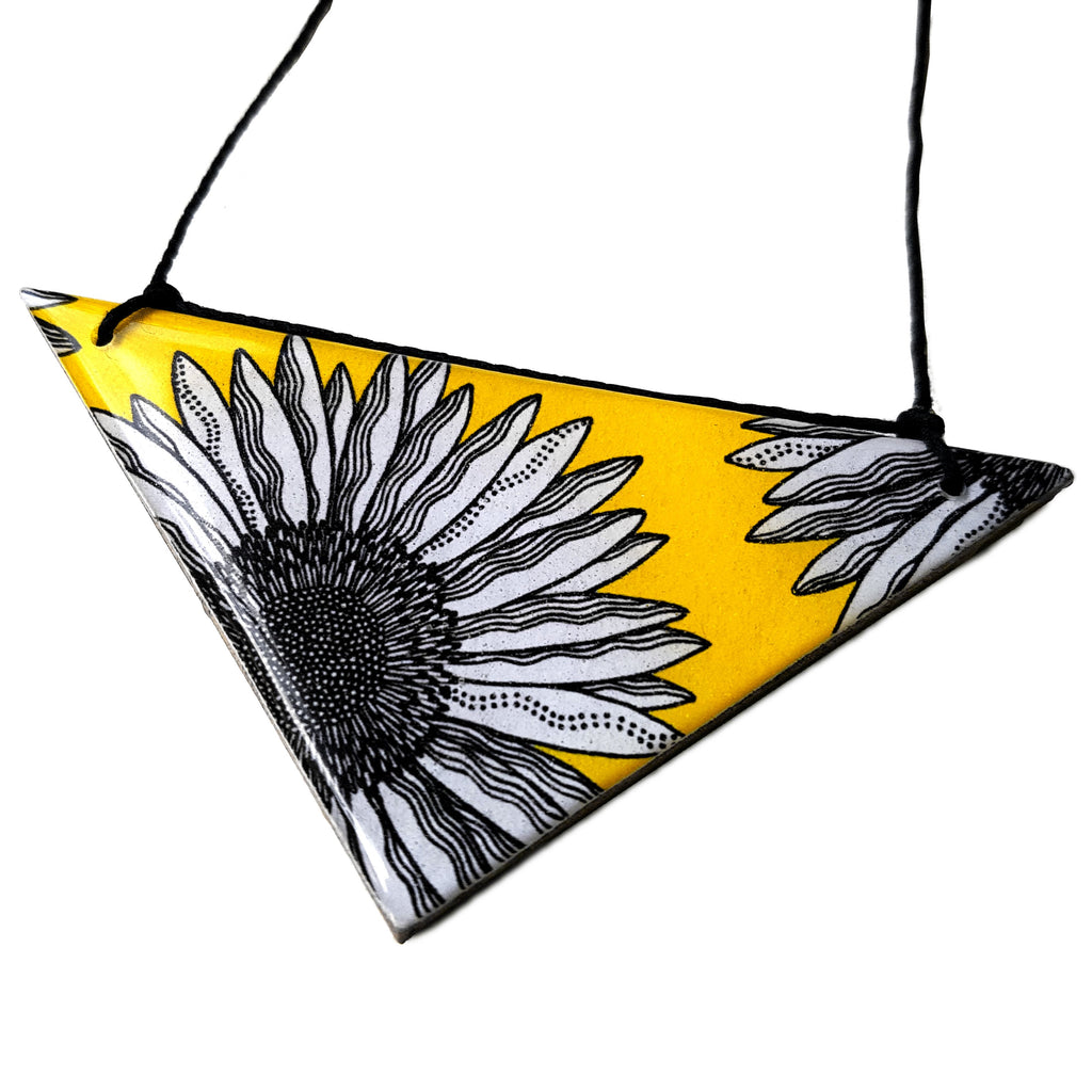 triangle pendant necklace in the pattern yellow daisy