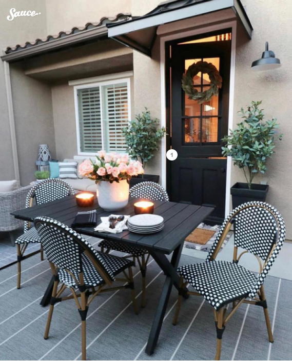 PINKYS Lifestyle image of exterior patio with iron doors