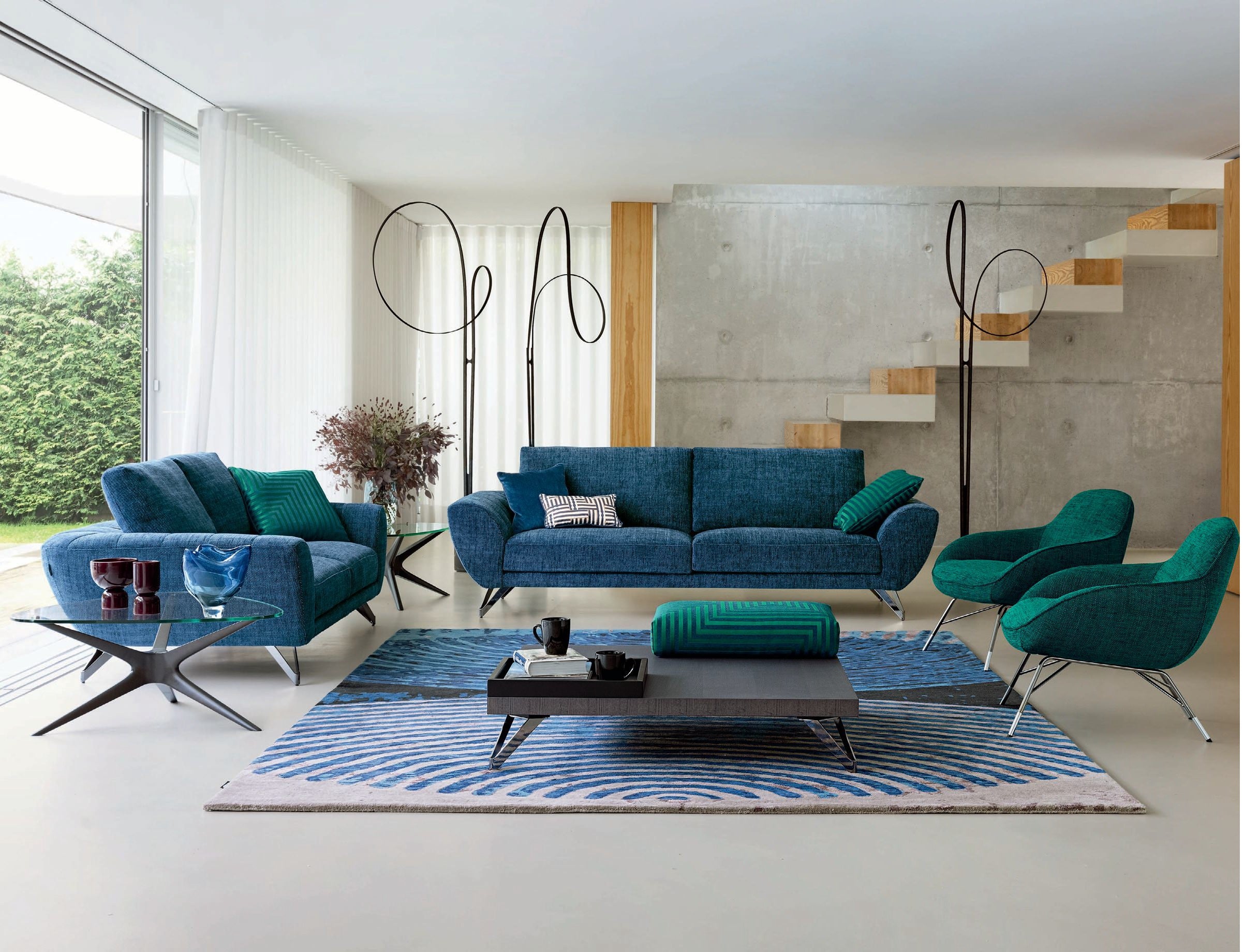 livingroom with blue-green sofas