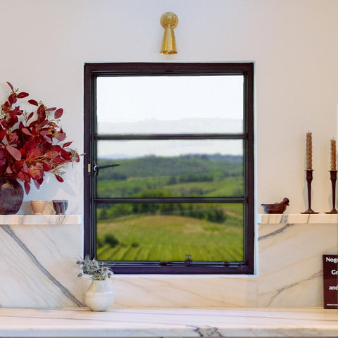 Contemporary steel window with two grid lines