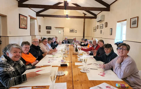 Large group having a birthday Paint and Plonk celebration at Bungaree Station