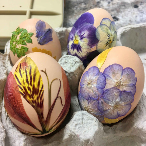 various pressed flower Easter eggs