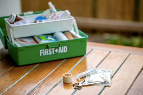 green first aid kit with the basics