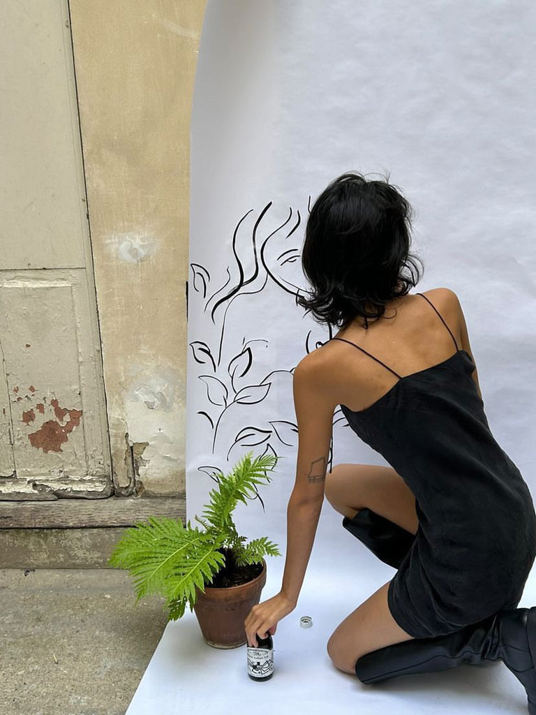 Parisian artist Gabrielle Rul in the Nova Slip Dress Black