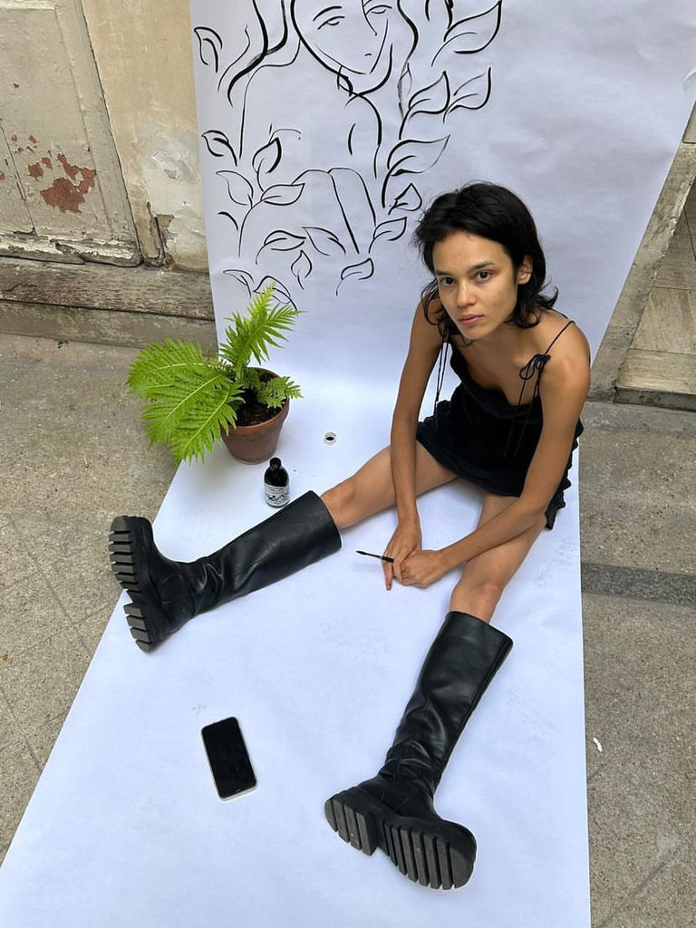 Parisian artist Gabrielle Rul in the Nova Slip Dress Black