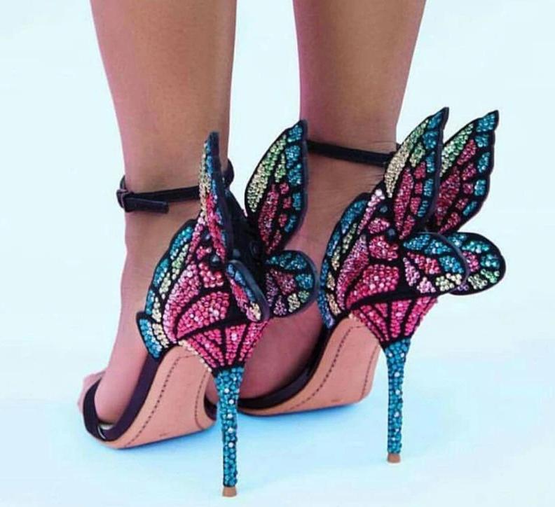 high heels with butterflies on the back