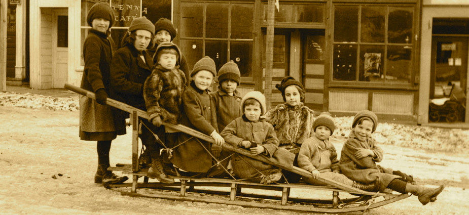 Children_on_an_Antique_Wood_Sleigh.jpg