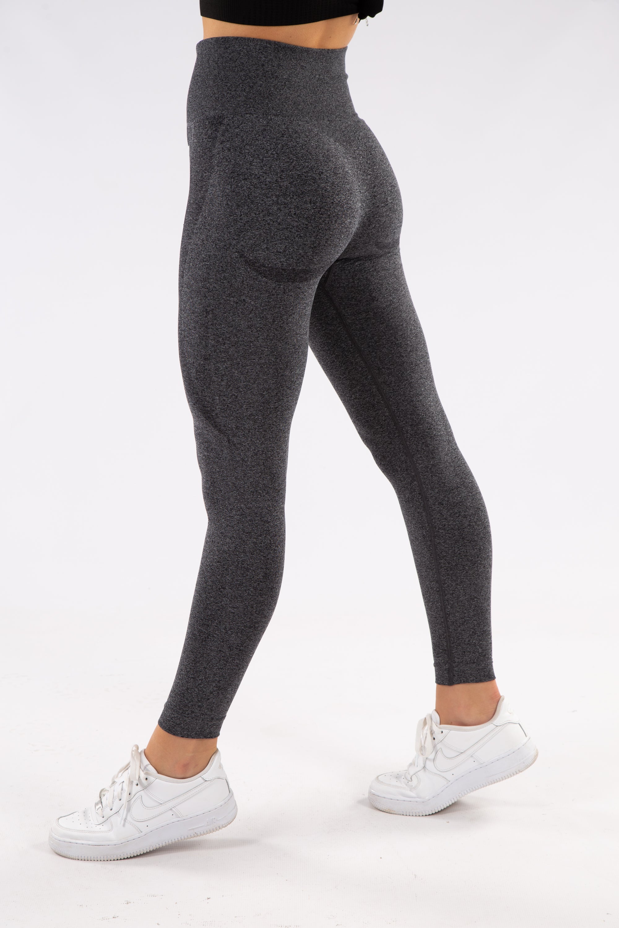Seamless leggings have contour shadowing designed to enhance the beauty ...
