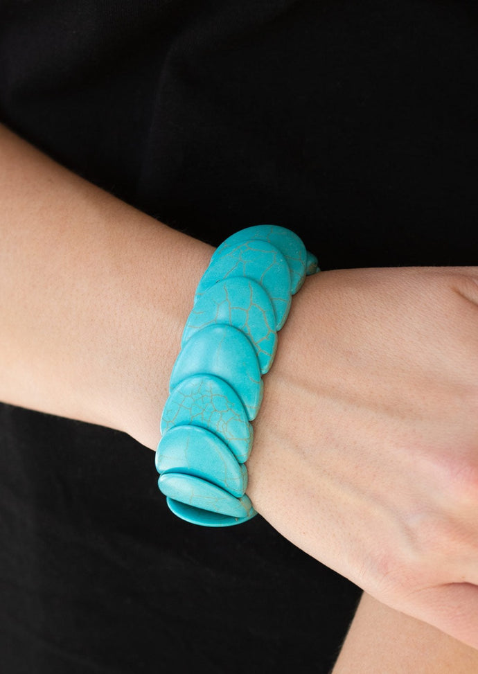 Overlapping turquoise stones are threaded along stretchy bands around the wrist for an artisan inspired look.  Sold as one individual bracelet.  Always nickel and lead free.Overlapping turquoise stones are threaded along stretchy bands around the wrist for an artisan inspired look.  Sold as one individual bracelet.  Always nickel and lead free.