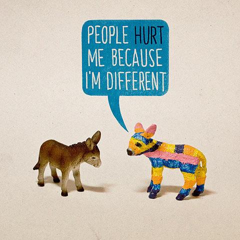 A brown dear and a multicolored deer with text "People hurt me because I'm different."