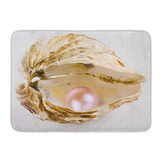 A seashell with a pink pearl inside