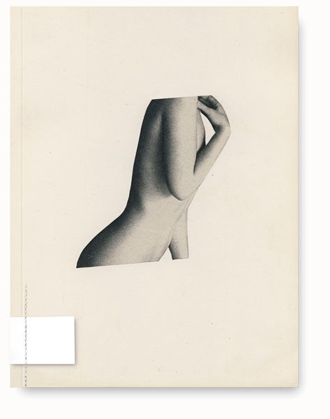 Book with a small black and white nude photo of a woman.