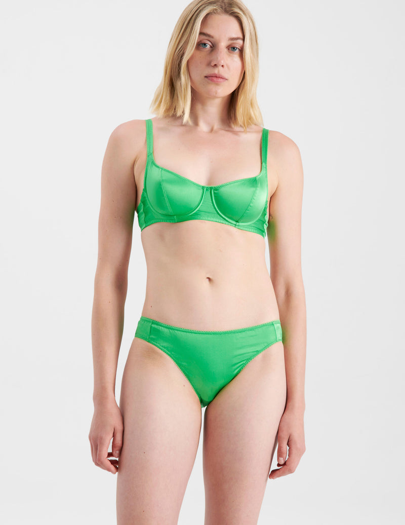 woman wearing green silk panties and matching bra