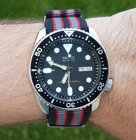 Seiko SKX007 on a 22mm Black and Grey with Red Nato from Watch Off The Cuff