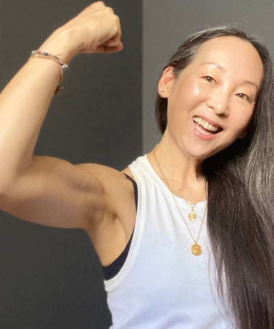 a woman showing her biceps