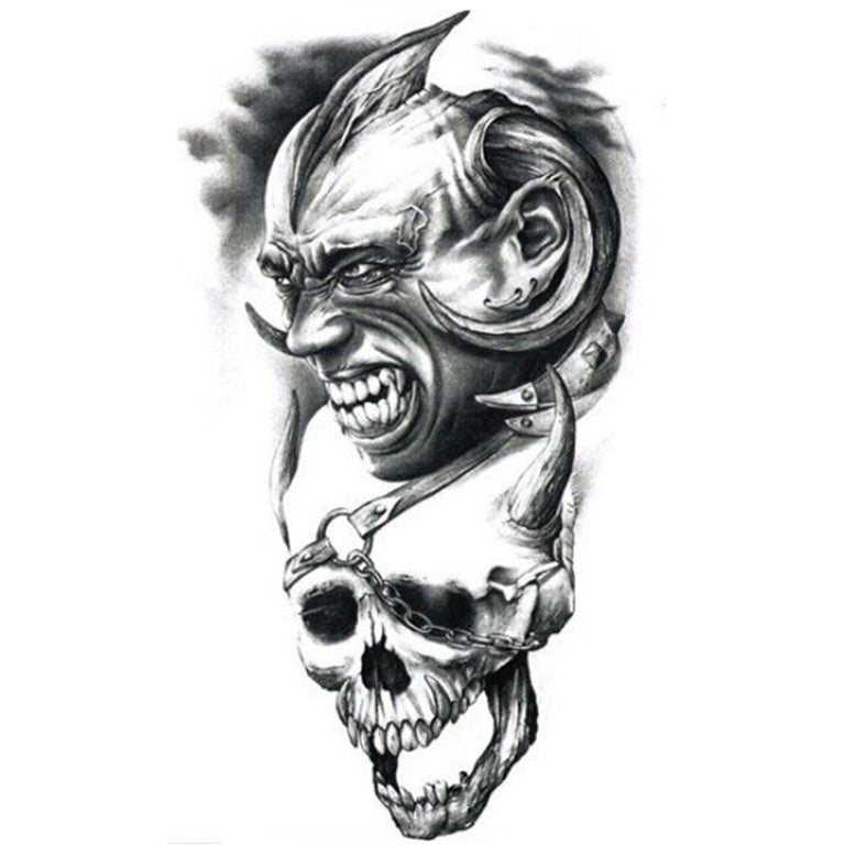 Black and grey shaded demonic skull tattoo on upper sleeve for men