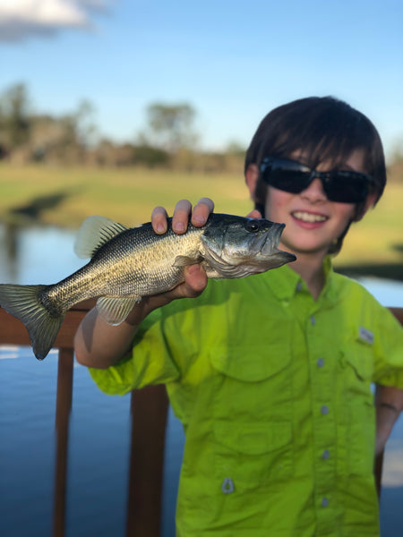 Levi Payne catches another bass on his fly rod!