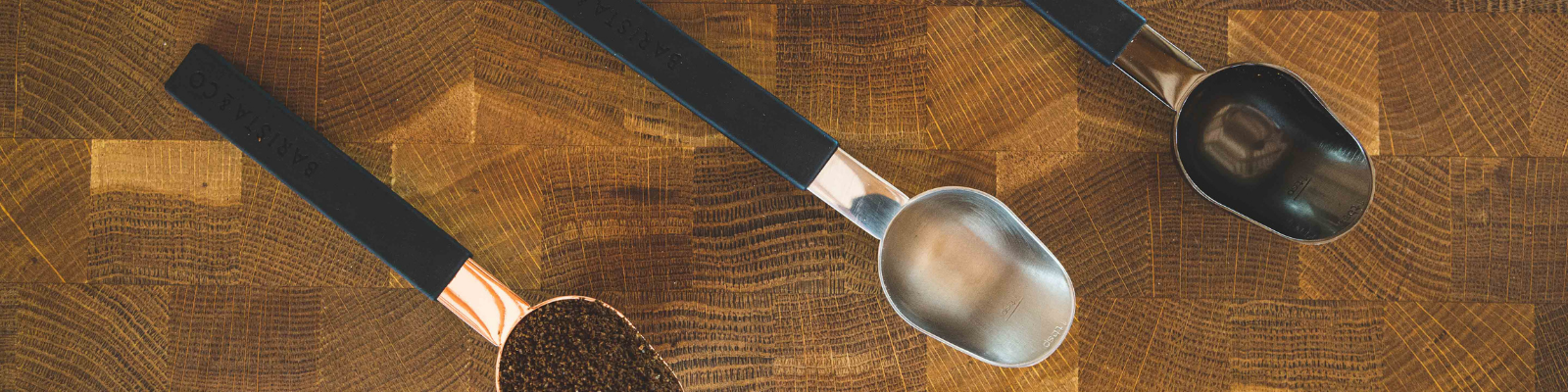 coffee scoop spoons with ground beans