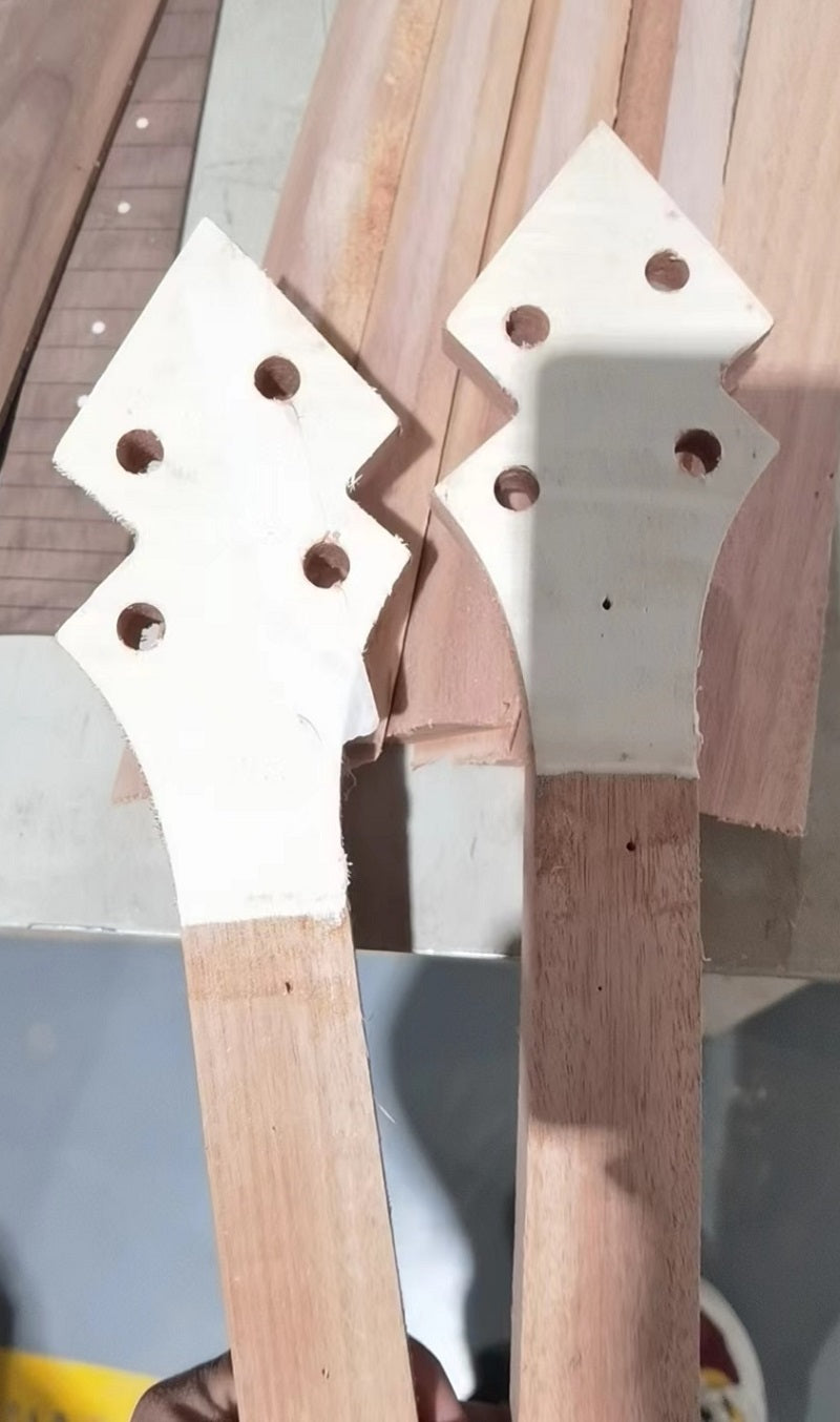 image showing the raw headstocks and necks of the duke10 banjolele