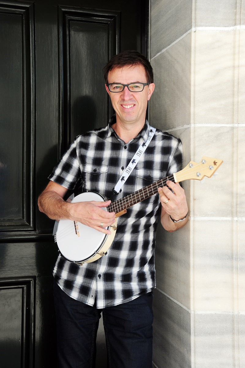 Jamie Houston showing off a DUKE10 Banjo Ukulele