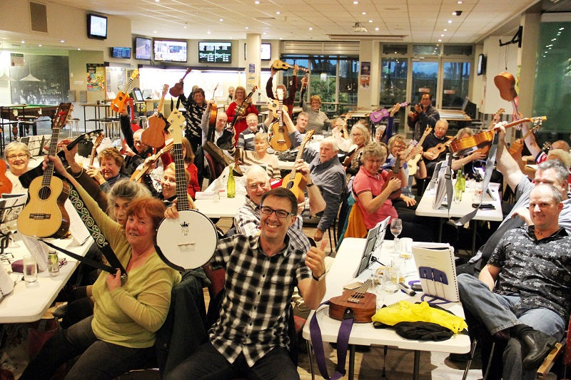 Jamie Houston with a DUKE10 at his local ukulele club - the Hutt Valley Ukulele Orchestra