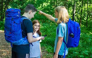 These campers are equipped with the proper camp gear.