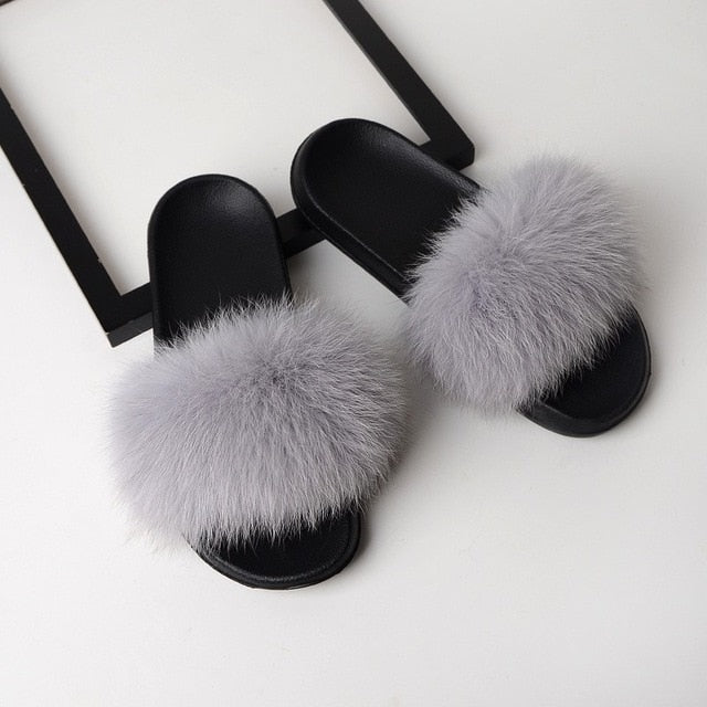 grey fuzzy slides