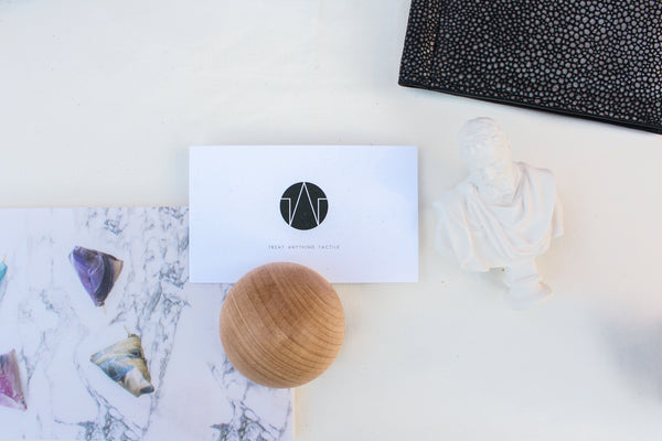 booth layout with name card and wooden ball 