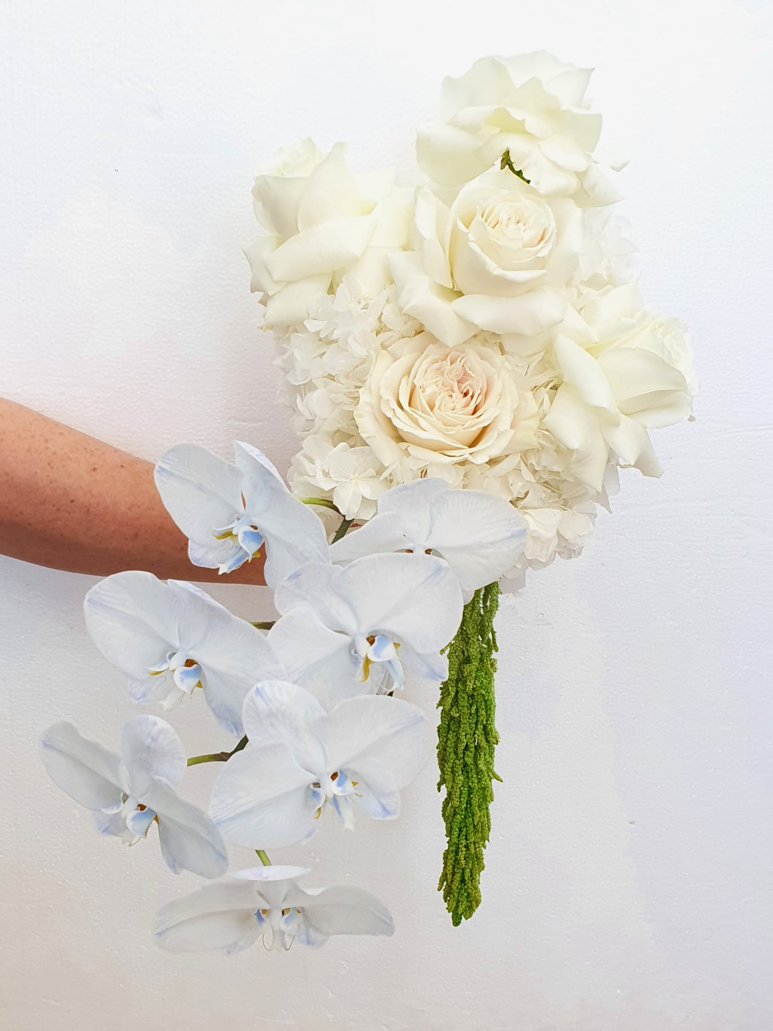 wedding flowers - white roses and clue orchids 